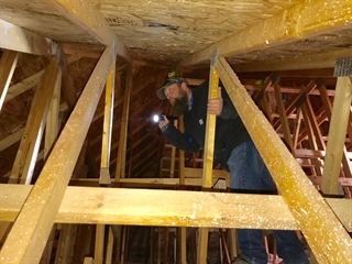 Inspecting attic